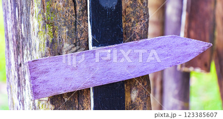 Colorful violet plain beach directional arrows on Ilha Grande Brazil. 123385607