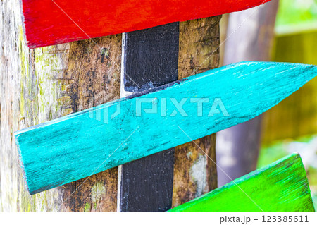 Colorful plain beach directional arrows on Ilha Grande Brazil. Colorful plain beach directional arrows on Ilha Grande Brazil. 123385611
