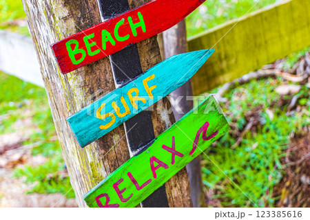 Sand beach surf relax colorful directional arrows Ilha Grande Brazil. Sand beach surf relax colorful directional arrows Ilha Grande Brazil. 123385616