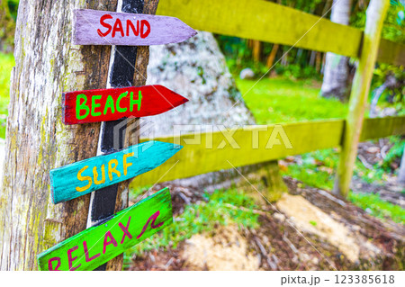 Sand beach surf relax colorful directional arrows Ilha Grande Brazil. 123385618
