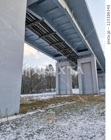 Vertical photo of an overpass under bridge 123386348