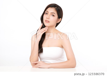 Beautiful young asian woman with clean fresh skin on white background, Face care, Facial treatment, Cosmetology, beauty and spa, Asian women portrait. Beautiful young asian woman with clean fresh skin on white background, Face care, Facial treatment, Cosmetology, beauty and spa, Asian women portrait. 123386370