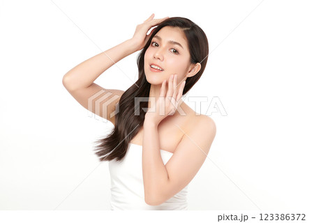 Beautiful young asian woman with clean fresh skin on white background, Face care, Facial treatment, Cosmetology, beauty and spa, Asian women portrait. Beautiful young asian woman with clean fresh skin on white background, Face care, Facial treatment, Cosmetology, beauty and spa, Asian women portrait. 123386372