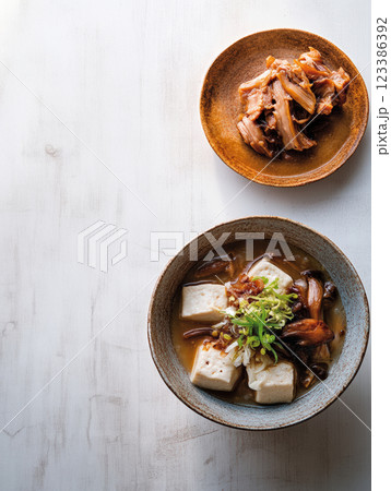 Tofu and mushroom soup with fresh garnish Tofu and mushroom soup with fresh garnish 123386392