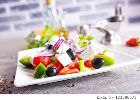 Salad with cheese and fresh vegetables . Greek salad. Salad with cheese and fresh vegetables . Greek salad. 123386673
