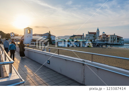 People visit Momochi Seaside Park at sunset in spring, Fukuoka People visit Momochi Seaside Park at sunset in spring, Fukuoka 123387414