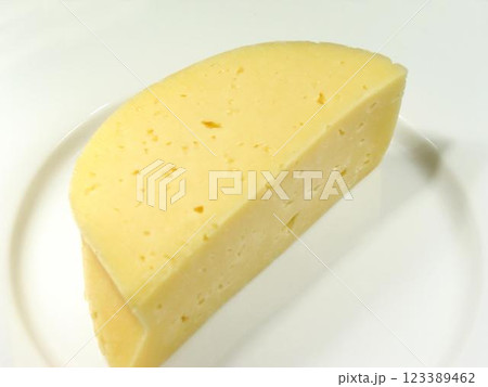 Sheep Milk Cheese and Baked Goods on Tableware with Fruit Sheep Milk Cheese and Baked Goods on Tableware with Fruit 123389462