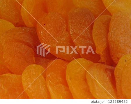 Dried apricots close view background 123389482