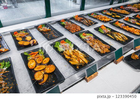 assorted of food and meat in the Asian buffet in hotel restaurant for breakfast in Asia in Vietnam assorted of food and meat in the Asian buffet in hotel restaurant for breakfast in Asia in Vietnam 123390450