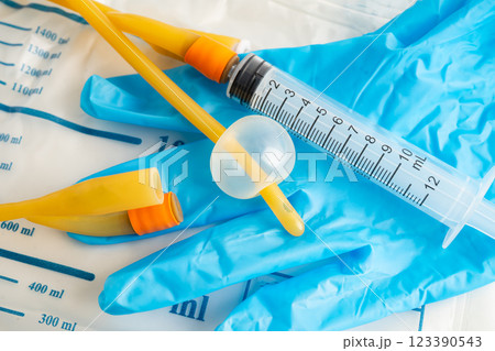 Foley catheter and urine drainage bag collect urine for disability or patient in hospital. 123390543