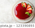 Elegant strawberry mirror glaze cake with mint 123390893