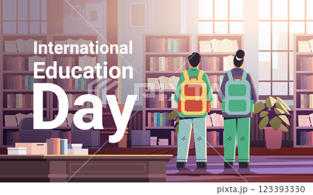 couple of rear view students with backpacks in casual clothes standing together in library education day concept full length couple of rear view students with backpacks in casual clothes standing together in library education day concept full length 123393330