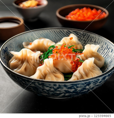 Exquisite Dumplings Garnished with Orange Roe Exquisite Dumplings Garnished with Orange Roe 123394665