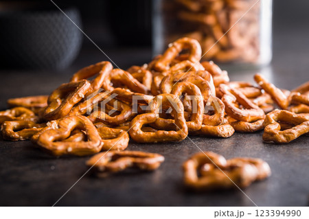 Heart shaped pretzel on black table. 123394990