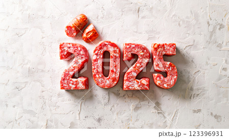 Creative salami 2025 concept on textured background for culinary innovation. Winter Holidays Concept , New Year 123396931