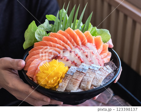 Sashimi Sushi Set on Plate Delicious sashimi bowl with fresh fish and octopus. 123398137