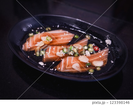 Salmon raw pickled in shoyu sauce or soy sauce 123398146