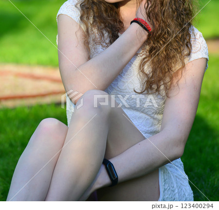 Young Woman in White Dress Posing at Sunset Young Woman in White Dress Posing at Sunset 123400294
