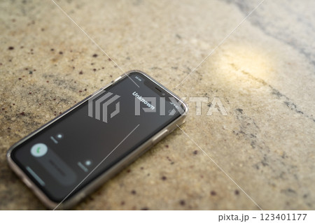 Fraud or fraudulent schemes. Close-up of a phone with an unexpected incoming call from an unknown person Fraud or fraudulent schemes. Close-up of a phone with an unexpected incoming call from an unknown person 123401177