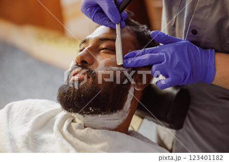 Enjoy a Relaxing Beard Shave Experience at the Barber Shop with a Skilled Professional Stylist Enjoy a Relaxing Beard Shave Experience at the Barber Shop with a Skilled Professional Stylist 123401182