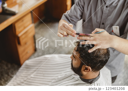 A Modern Haircut Experience in a Professional Barbershop Setting Focused on Style and Confidence 123401208