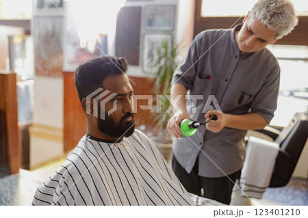 Barbershop Scene A Stylish Haircut in Progress at a Local Barber Shop for Clients Needs 123401210