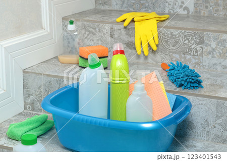 Household cleaning products and items for cleaning tile in house. Cleaning and cleanliness. Household cleaning products and items for cleaning tile in house. Cleaning and cleanliness. 123401543