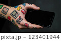 composite image of hands holding smartphone 123401944