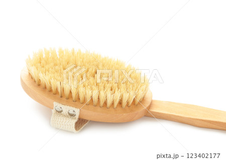 Brush for dry anti-cellulite massage or brushing on white background. 123402177