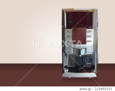 front view silver and red Automatric coffee machine on red floor and wall cream background, technology, drink, kitchen, copy space 123402331