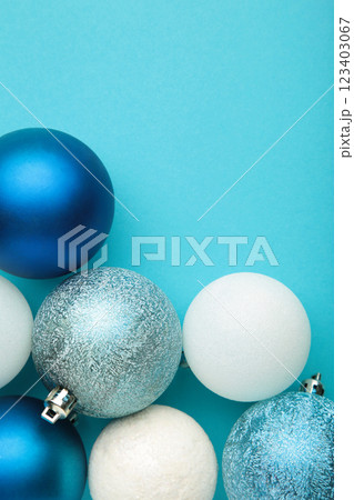 Christmas composition. Christmas blue and white balls on blue background. 123403067