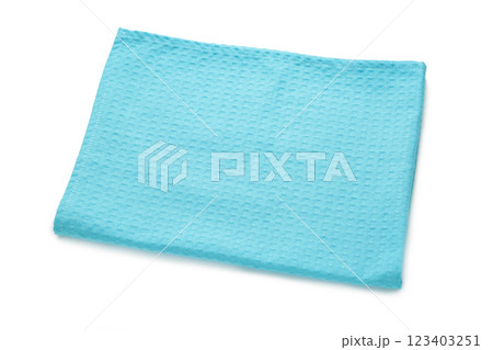 The checkered tablecloth isolated on white. Decorative blue cotton napkin. 123403251