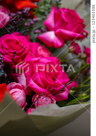 Beautiful Bouquet of magenta fuchsia color roses 123403398