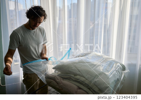 Vacuum Sealing Clothes Effectively for Storage, Preservation, and Space Saving Solutions 123404395