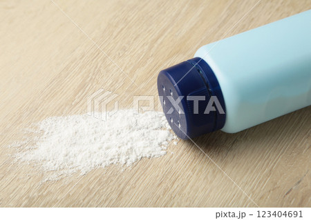 Baby powder on light background. Baby cosmetics. Space for text Baby powder on light background. Baby cosmetics. Space for text 123404691