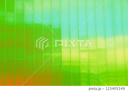 background of glass windows of a modern office building, glass facade, changed color scheme. 123405149