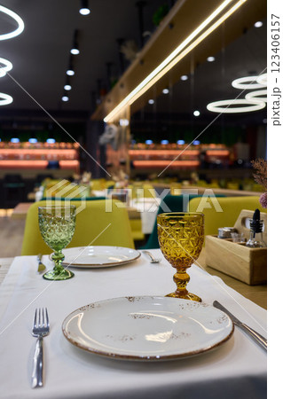A beautifully designed restaurant interior with modern aesthetics and stylish lighting A beautifully designed restaurant interior with modern aesthetics and stylish lighting 123406157
