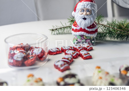 Christmas chocolates. Chocolate Christmas trees and Santa Claus. 123406346