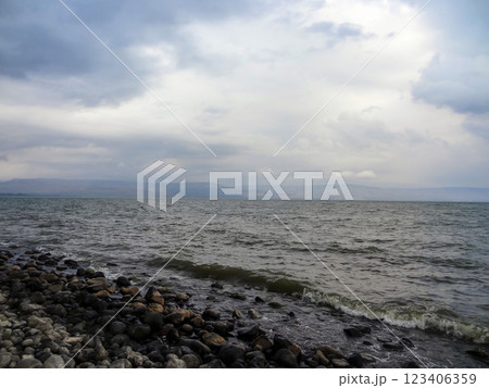 Rocky shore of the sea or lake.The sea of Galilee also called Lake Tiberias or Kinneret, Israel. Rocky shore of the sea or lake.The sea of Galilee also called Lake Tiberias or Kinneret, Israel. 123406359