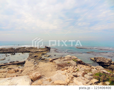 Rocky coast near the ancient Caesarea national park on the Mediterranean coastline, Israel. Rocky coast near the ancient Caesarea national park on the Mediterranean coastline, Israel. 123406400