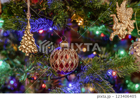 Christmas tree decorated with balls and gerland. 123406405