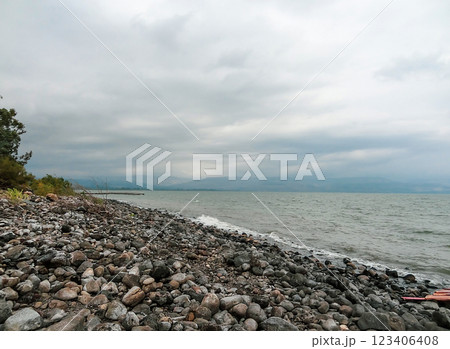 Rocky shore of the sea or lake.The sea of Galilee also called Lake Tiberias or Kinneret, Israel. Rocky shore of the sea or lake.The sea of Galilee also called Lake Tiberias or Kinneret, Israel. 123406408