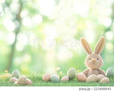 Soft green pastel background with scattered eggs and plush bunny for Easter decorations 123406643