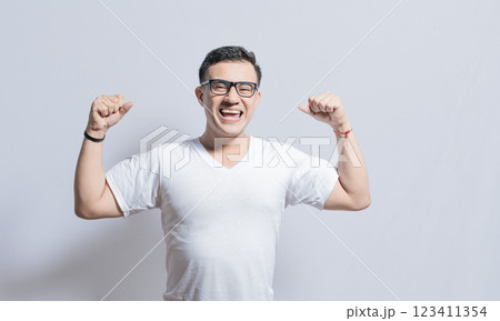 Person with Happy face raising arms in victory gesture isolated, winner person celebrating victory isolated, excited man raising arms celebrating victory Person with Happy face raising arms in victory gesture isolated, winner person celebrating victory isolated, excited man raising arms celebrating victory 123411354