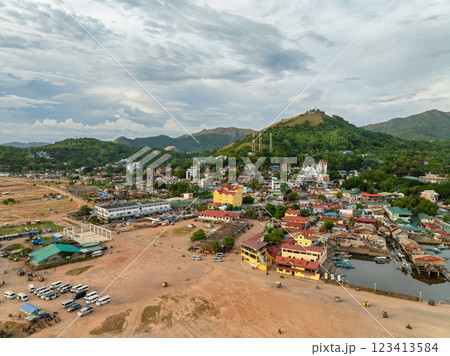 Drone view of Coron Town Proper in Palawan. Blue sky and clouds. Philippines. Drone view of Coron Town Proper in Palawan. Blue sky and clouds. Philippines. 123413584
