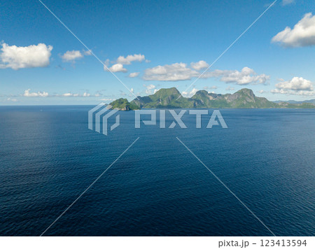 Helicopter Island and Cadlao Island with blue sea. Blue sky and clouds. El Nido, Philippines. 123413594