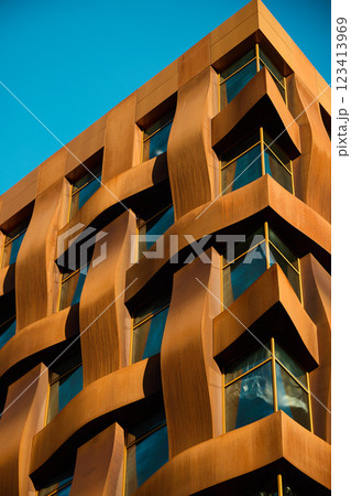 An Architectural Marvel featuring Unique Textures and Stunning Reflections throughout its Design 123413969