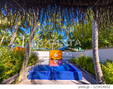 Sunset views from overwater pool villa in Maldives Sunset views from overwater pool villa in Maldives 123414652