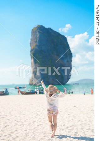 Woman tourist traveling and sightseeing in Krabi, Thailand. happy traveller enjoy on beach at Koh Poda island. summer trip, destination, Southeast Asia Travel, vacation and holiday concept Woman tourist traveling and sightseeing in Krabi, Thailand. happy traveller enjoy on beach at Koh Poda island. summer trip, destination, Southeast Asia Travel, vacation and holiday concept 123414841