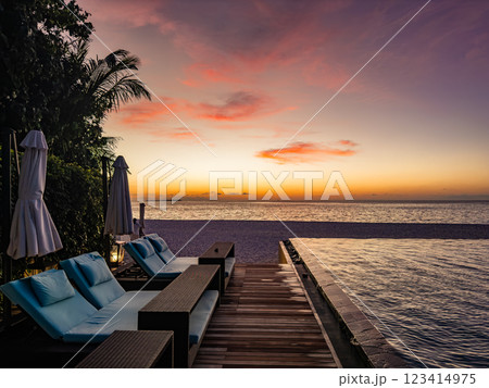 Sunset views from overwater pool villa in Maldives Sunset views from overwater pool villa in Maldives 123414975